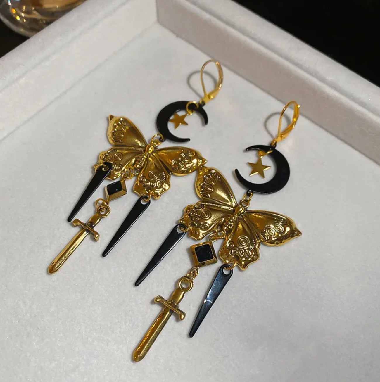 Moonblade butterfly earring