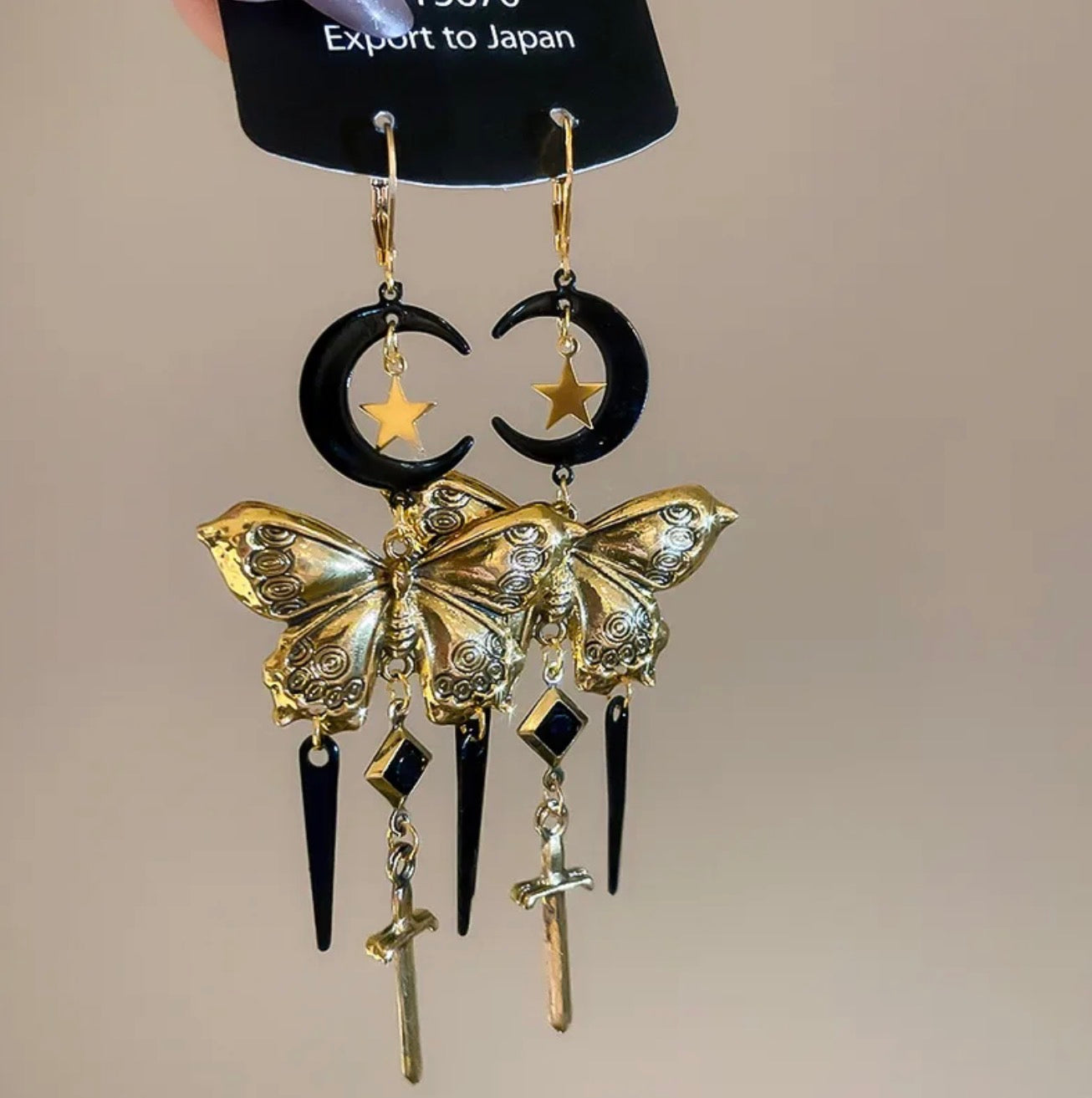 Moonblade butterfly earring